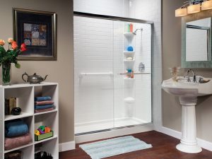 Modern bathroom with white subway tiles shower enclosure.