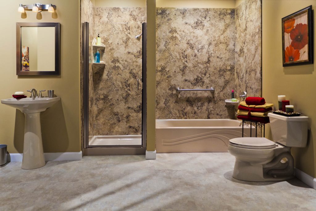A bathroom with a toilet, sink, bathtub, and shower in DFW by Affordable 1 Day Baths