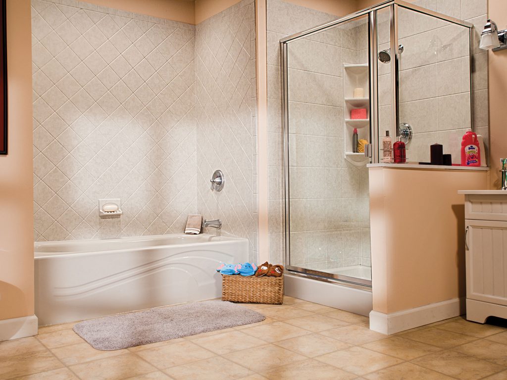 A bathroom with a bathtub, shower, and vanity.