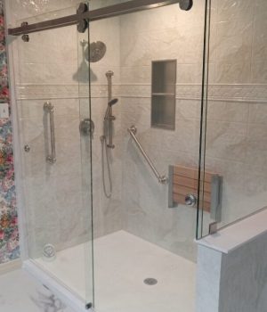 Shower replacement to a modern glass door shower.
